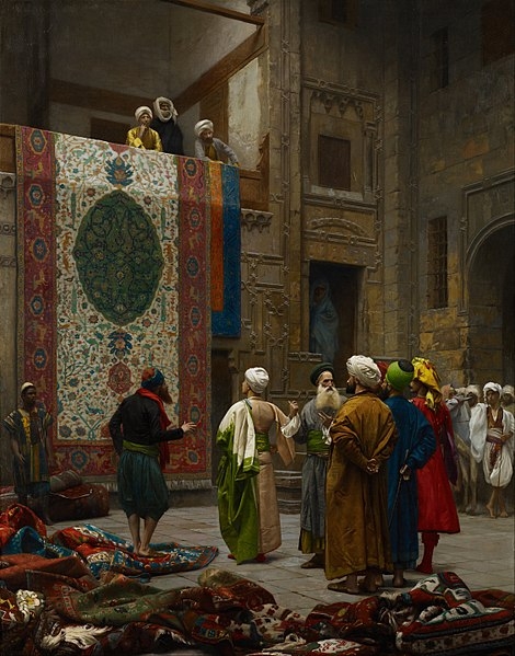 Der Teppichhändler/Teppichhändler in Kairo von Jean-Léon Gérôme (ca. 1887), mehrere Personen schauen sich zusammen mit dem Teppichverkäufer einen großen, an der Wand hängenden Teppich an